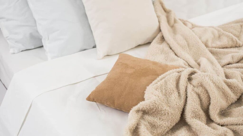 Soft light latte colored bedding.
