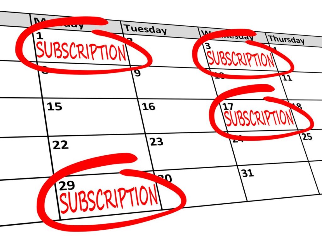 A calendar showing the month with the word “SUBSCRIPTION” written in red and circled on multiple dates, emphasizing recurring payments.
