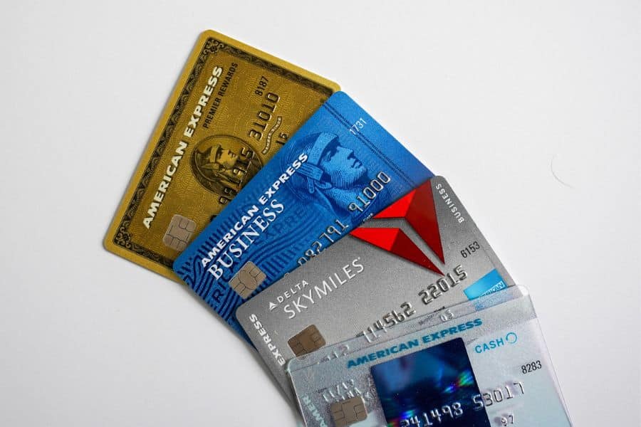 A close-up view of various American Express credit cards, visually reinforcing the frustration when travelers discover US credit cards don’t work in this European city.