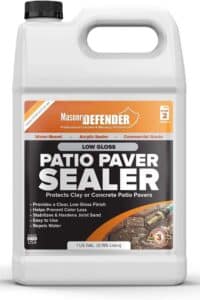 Product bottle labeled "MasonryDEFENDER Professional Concrete and Masonry Solutions. STEP 2 PROTECT. Water Based. Acrylic Sealer. Commercial Grade. LOW GLOSS PATIO PAVER SEALER. Protects Clay or Concrete Patio Pavers. Provides a Clear Low Gloss Finish. Helps Prevent Color Loss. Stabilizes and Hardens Joint Sand. Easy to Use. Repels Water. MADE IN THE USA. 1 US GAL. 3.785 Liters. THREE YEAR WARRANTY." This product shot supports patio maintenance after removing weeds between your patio stones.