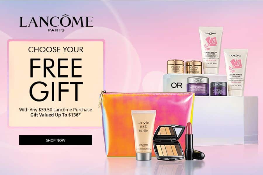 Pink Lancôme promotion with beauty products and gift bags displayed beside large offer text that reads "LANCÔME PARIS", "CHOOSE YOUR FREE GIFT", "With Any $39.50 Lancôme Purchase", "Gift Valued Up To $136*", "OR", and "SHOP NOW". This is useful for retailer tricks content because it shows a gift with purchase offer designed to make shoppers spend more to unlock a reward.