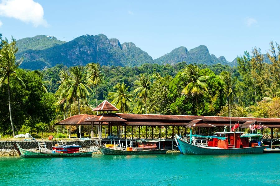 A river image of Malaysia with small boats on the water