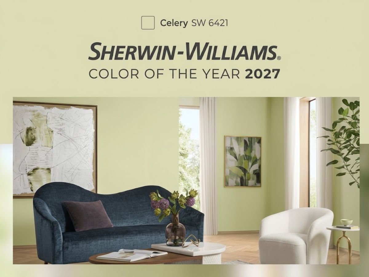 Sherwin Williams graphic announcing Celery SW 6421 as the 2027 color of the year. The pale green shade appears on the walls of a bright living room with a dark blue sofa white chair artwork and leafy decor.
